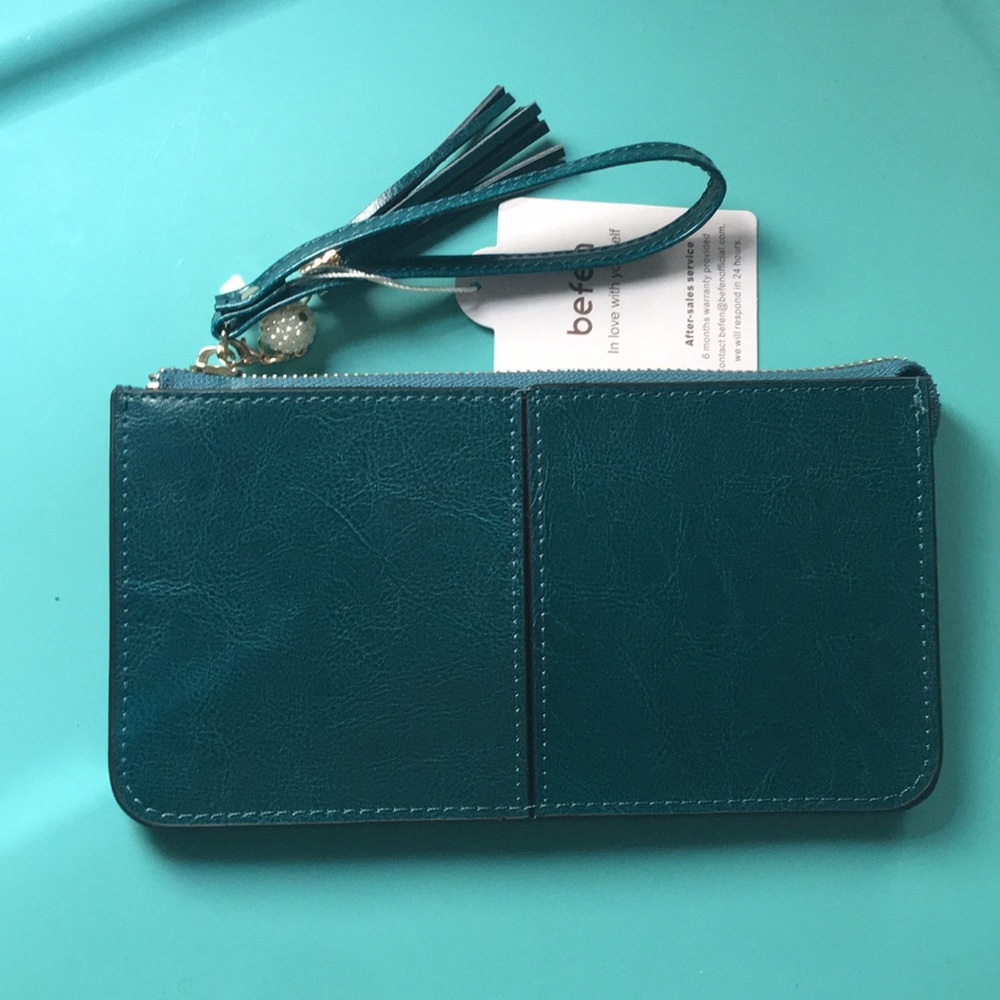 Teal wristlet.